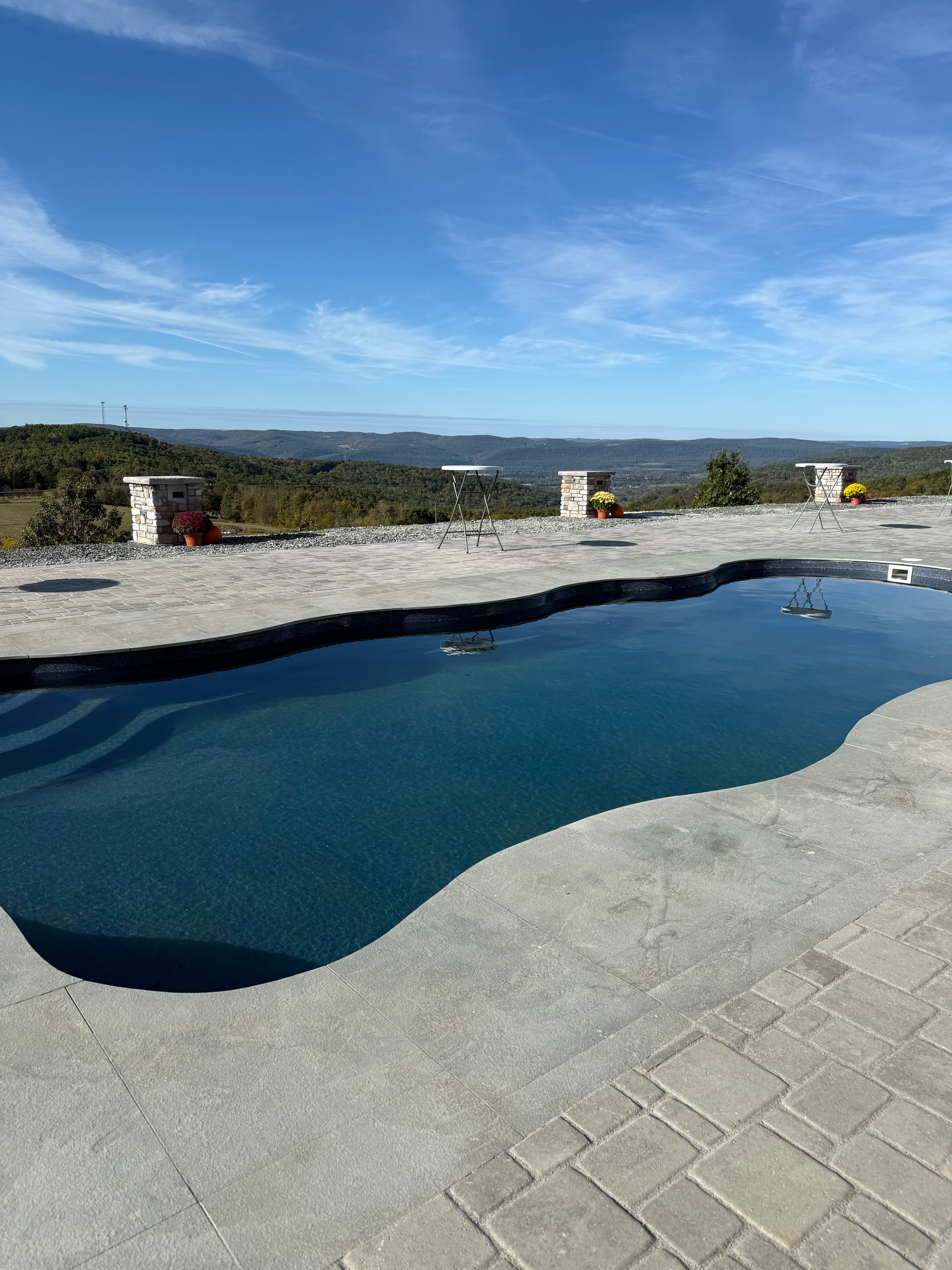 Outdoor pool with mountain backdrop